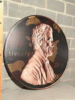 Full view of penny side showing design and scale