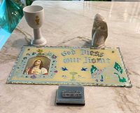 All four religious items grouped on countertop