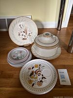 Complete lot with plates stacked, crock with lid, patterns visible