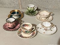 All six demitasse pairs displayed