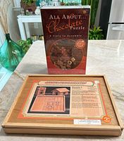 Front view showing puzzle box and wooden building set box