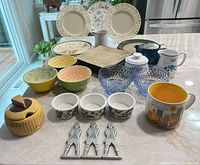 Group shot showing all dinnerware pieces laid out on countertop