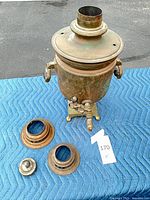 Full samovar assembled with loose parts displayed
