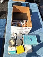 overview of all items in Xerox box and on blanket