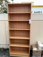 Full frontal view of seven-shelf bookcase