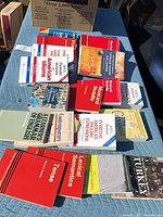Books laid out on blanket showing linguistics and ESL titles