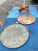 Overall view of two trays and stand on blanket