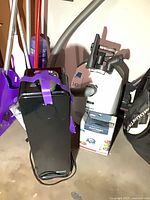 Miele vacuum and GermGuardian purifier on floor