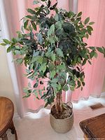 Full view of faux tree in basket