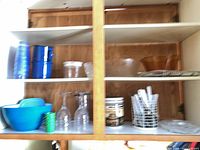 Cabinet shelves with all items displayed