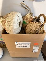 Cardboard carton containing mixed marine floats