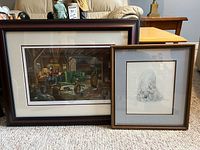 Both framed prints side by side for scale