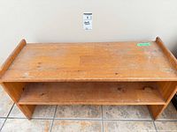 front view of wooden two-shelf rack