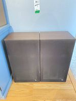 Front view of both JVC speakers with grilles