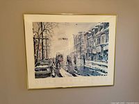 Overall view of framed Queen Street West poster on wall