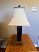 Full view of lamp showing base and shade