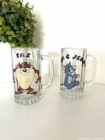 Both glass steins front view