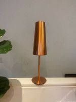 Full view of copper Tallvik table lamp