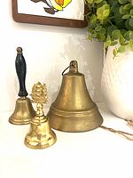 Front view of all three brass bells