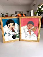 Front view of both framed Pierrot prints