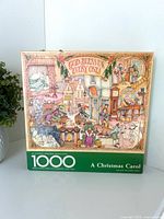 Front of Springbok A Christmas Carol puzzle box showing artwork and piece count