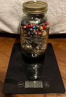 Full view of jar on digital scale