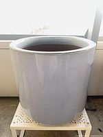 Top angled view of baby blue glazed ceramic planter