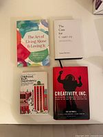 Front covers of the four books