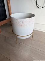 planter on gold stand full view