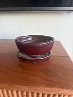 Planter on matching saucer showing exterior glaze and shape