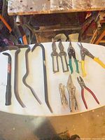 Overview of all hand tools laid out on table