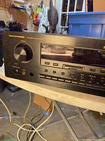 Front view showing Marantz logo, control knob, buttons and display