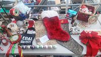 overview of stockings, ornaments, bow, coal bag, mantle hanger