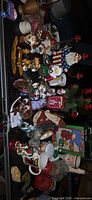 Table view of assorted holiday, western and Disney decorative items