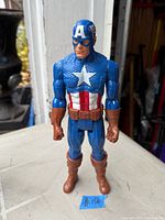 Front full-length view of Captain America action figure on tabletop
