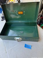 Box open showing interior and key