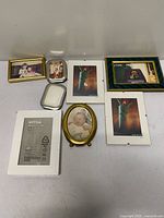 All eight picture frames laid out