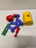 group shot of all seven wooden construction pieces