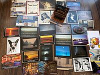 Overview of all postcards laid out on floor