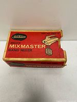 Red Sunbeam Mixmaster box showing model information and wear