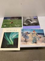 All four calendars laid out on table