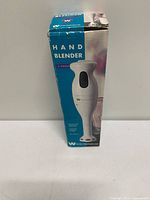 Box front view showing hand blender branding