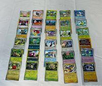 Full layout of all 33 Pokémon cards displayed in three columns