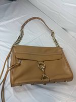Full view of Rebecca Minkoff tan leather crossbody bag