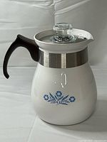Front view of Corning Ware Blue Cornflower 6-cup percolator with lid