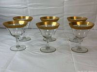 All six coupe glasses front view