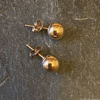 Pair of gold ball stud earrings