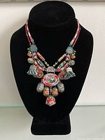 Full view of necklace on display bust