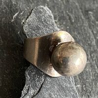 Full view of ring showing sphere and band