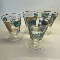 Four stemmed glasses showing overall design